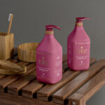 Two Cosmetic Pump Bottles on Wooden Table Mockup