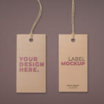 Two Embossed Hangtags Laid on the Surface in Top View Mockup
