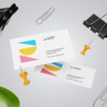 Two Falling Business Card Mockups with Floating Paper Clips