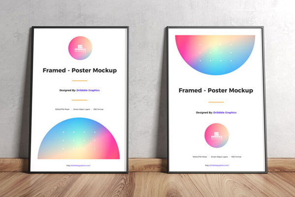 Two Framed Posters on Wooden Floor Leaning Against Wall Mockup