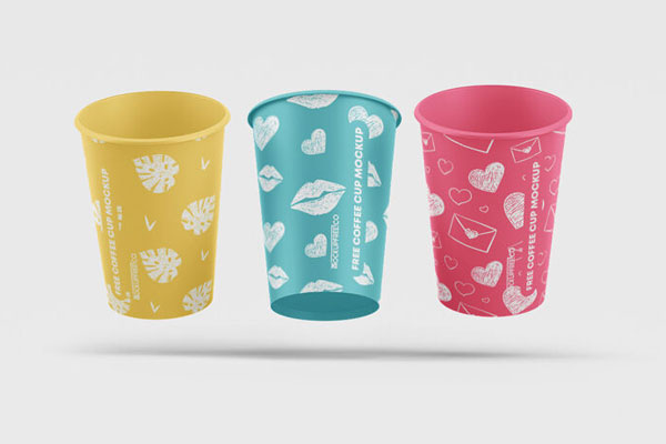 Two Mockups Featuring Front Views of Floating Paper Coffee Cups