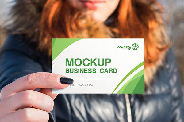 Two Mockups of a Business Card Featuring a Lady Holding it in Different Views