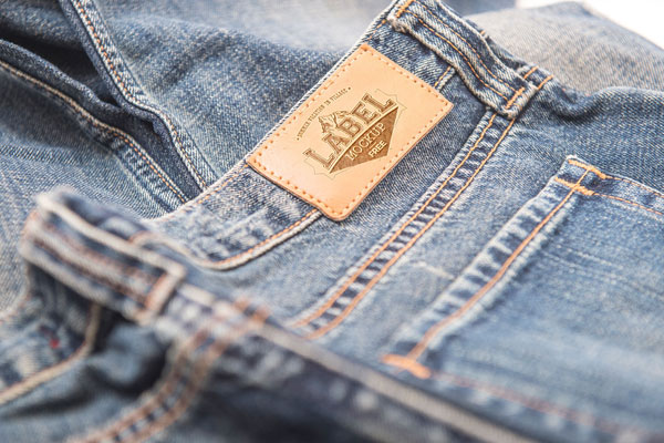 Two Mockups Showing Close-up View of Two Clothing Labels