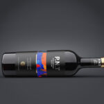 Two Mockups Showing Front View of Horizontal Wine Bottle