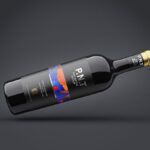 Two Mockups Showing Front View of Horizontal Wine Bottle