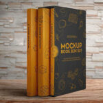 Two Mockups Showing Slipcase and Books on Wooden Table