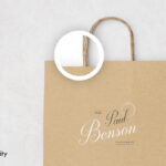 Two Mockups Showing Standing and Laid on the Ground Paper bags