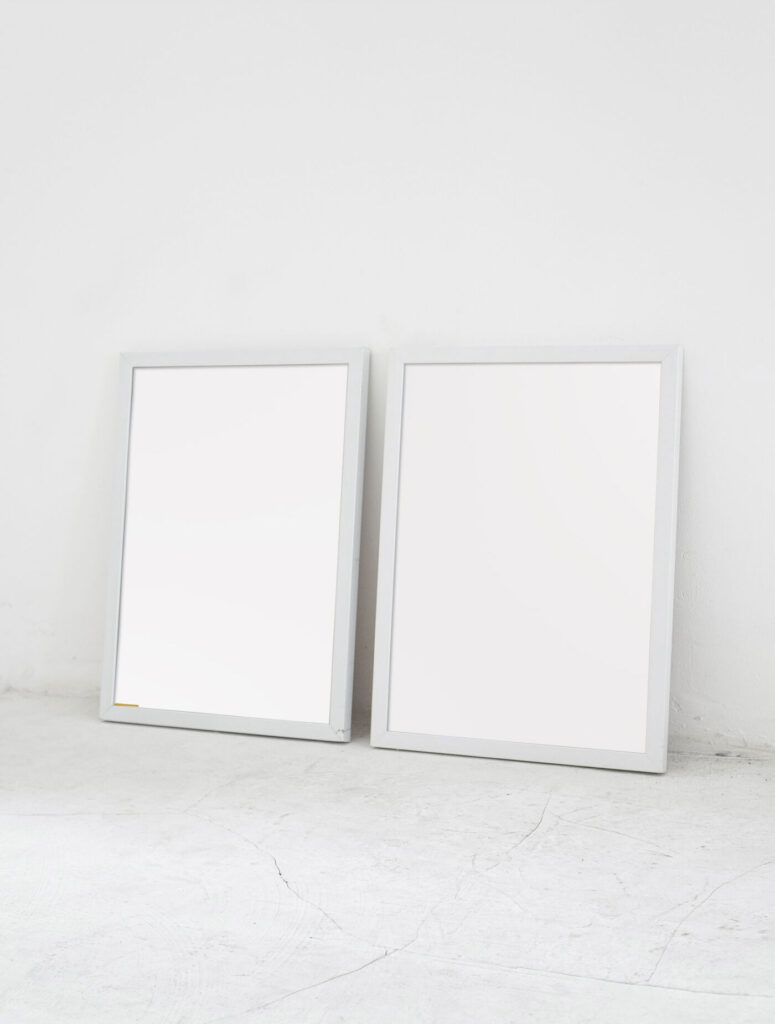 Two Poster Leaning Against the Wall Mockup