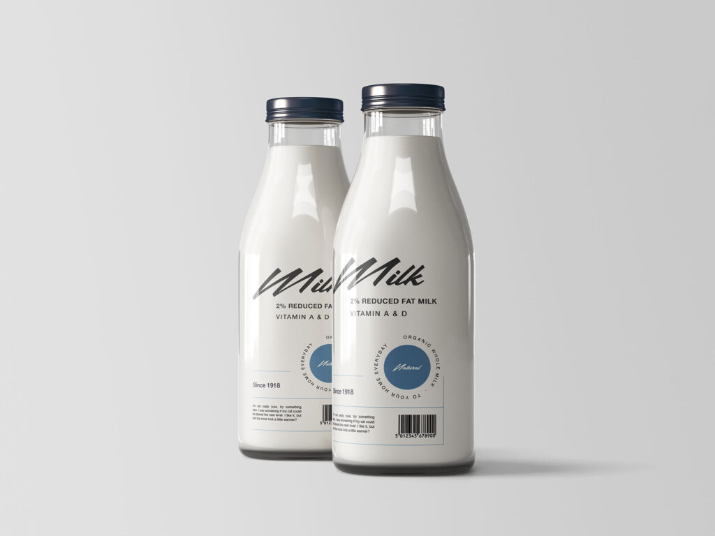 Two Shiny Glass Bottles Filled with Milk Mockup