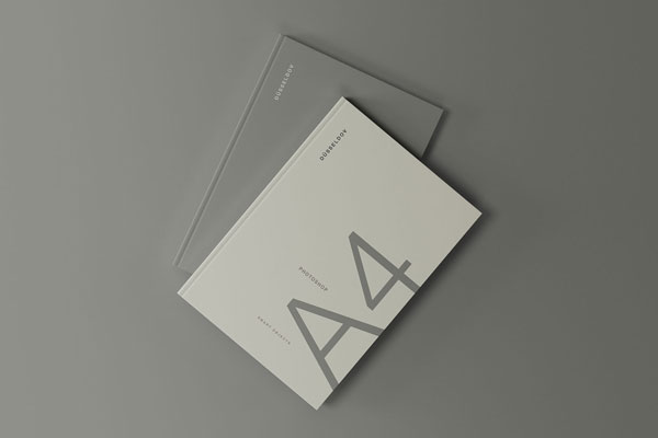 Two Slim Hardcover Books Placed on Each Other Mockup