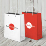 Two Vertical Shopping Bags with a Wooden Background Mockup