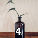 Vase Bottle Mockup on a Wooden Table