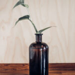 Vase Bottle Mockup on a Wooden Table