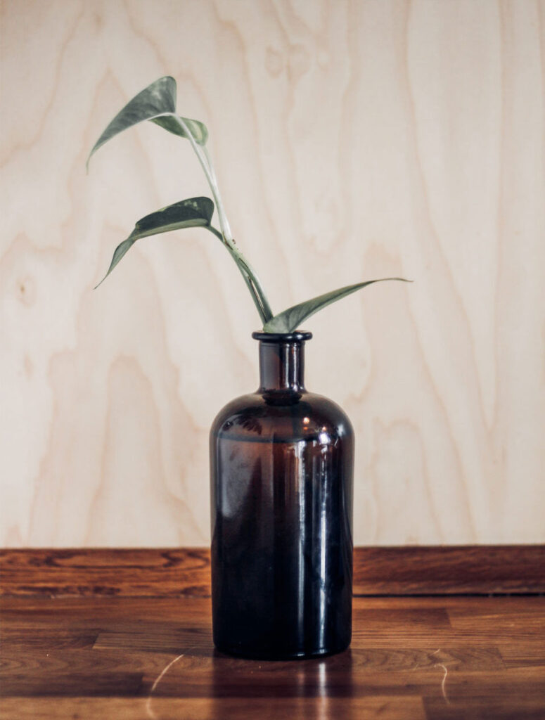 Vase Bottle Mockup on a Wooden Table