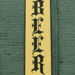 Vertical Bar Sign Stick to Wall Mockup