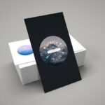 Vertical Business Card Leaning against Stack of Horizontal Cards Mockup