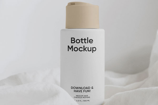 Vertical Cream Bottle on Fabric Mockup