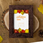 Vertical Photo Frame Mockup Featuring Autumn Leaves in Top View