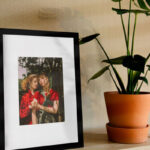 Vertical Photo Frame on a Shelf in the Half-Side View Mockup