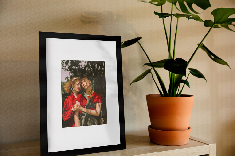 Vertical Photo Frame on a Shelf in the Half-Side View Mockup