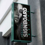 Vertical Shop Signboard Mockup with Metallic Frame on Building