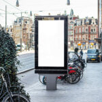 Vertical Signage on the Sidewalk in Half-Side View Mockup