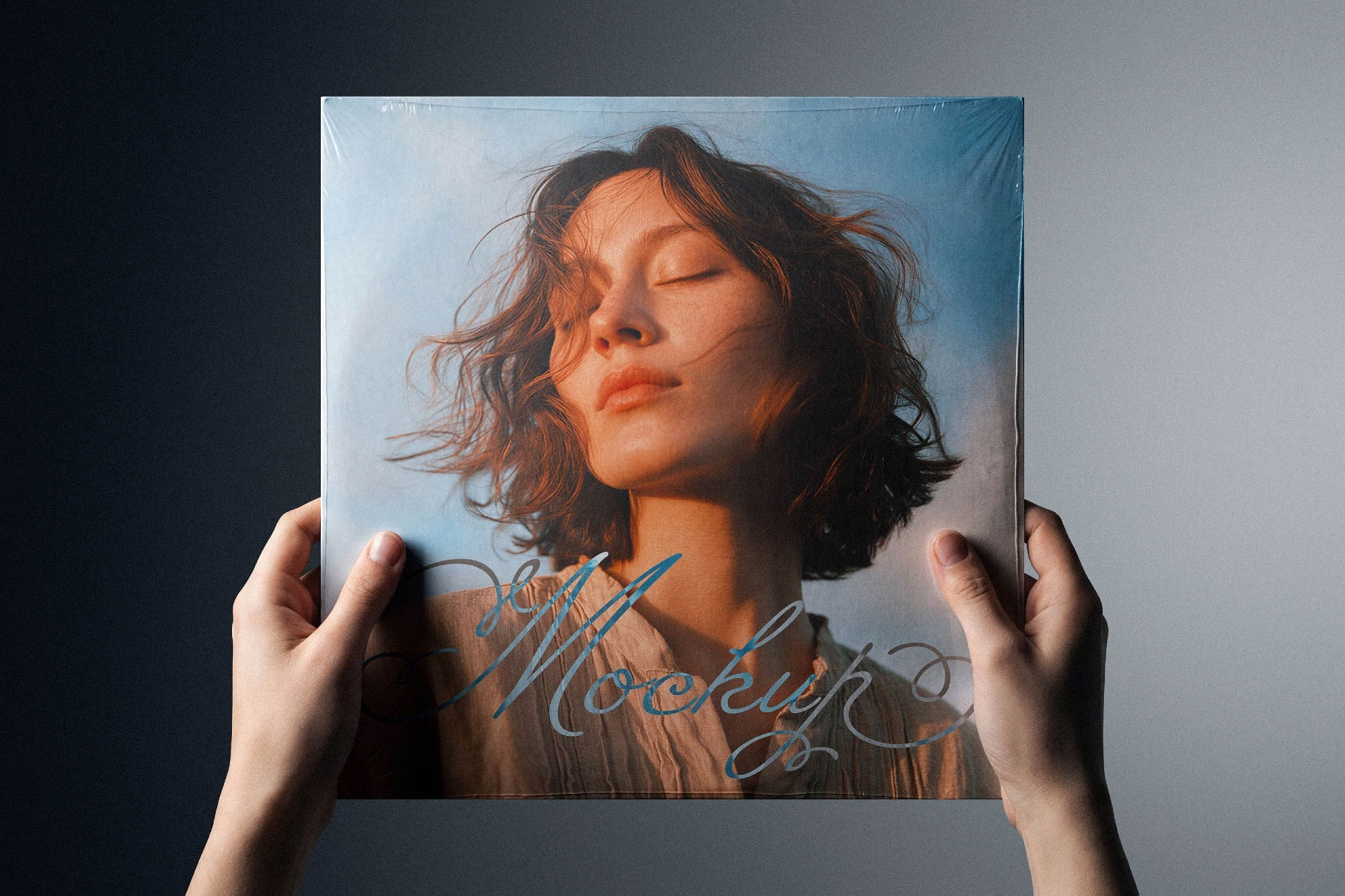 Free Vinyl Cover Mockup in Hand PSD Template