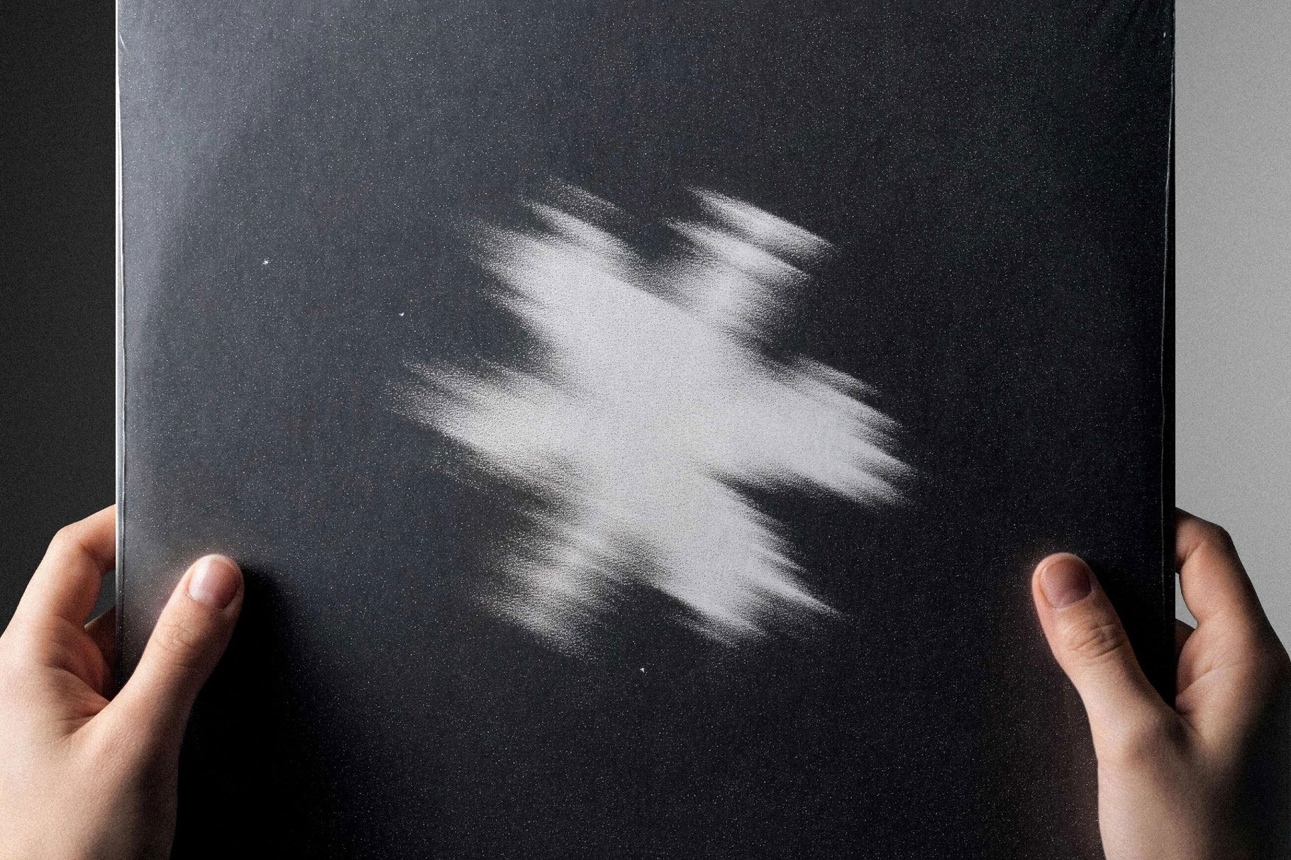 Free Vinyl Cover Mockup in Hand PSD Template