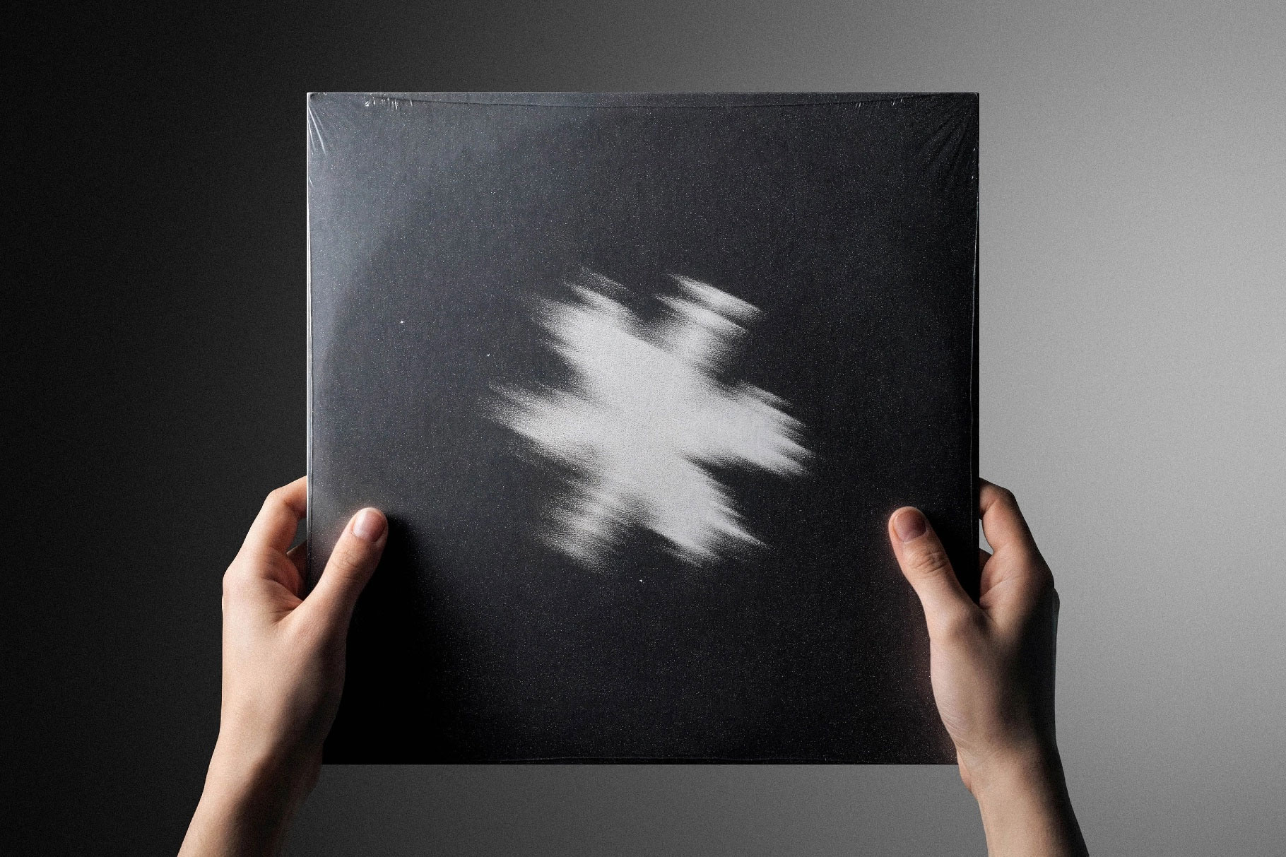 Free Vinyl Cover Mockup in Hand PSD Template