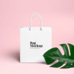 Minimal Shopping Bag Beside a Large Leaf Mockup
