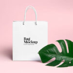 Minimal Shopping Bag Beside a Large Leaf Mockup