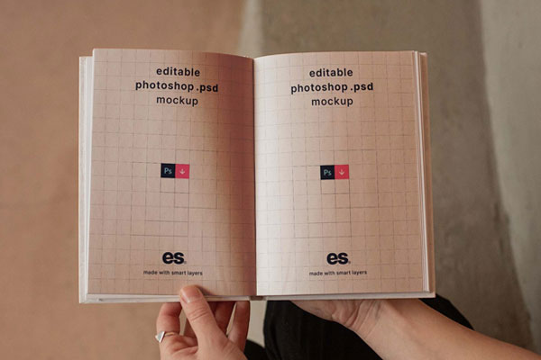 Woman Hand-holding Opened Hardcover Book Mockup
