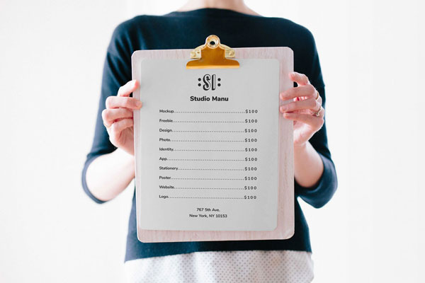 Woman Holding a Clipboard Mockup