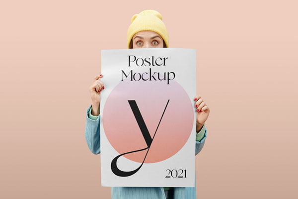Women Holding a Poster in Front of Her Mockup