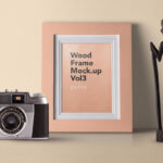 Wooden Frame Mockup Along with Decorative Camera
