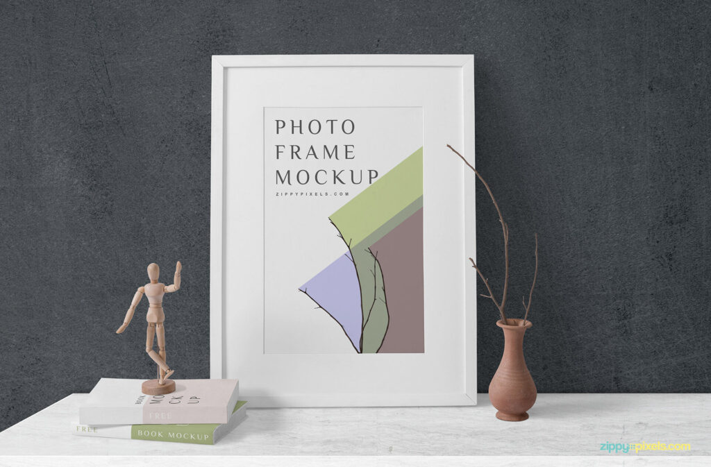 Wooden Frame Mockup with Books and Decorative Elements